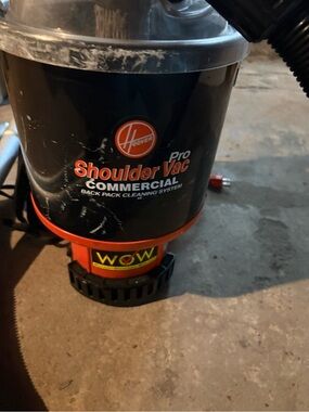 WOW  Black and Orange Commercial Backpack Vacuum Unit